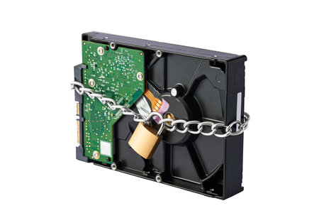 The hdd disk is chained with a closed padlock. isolated on white background.