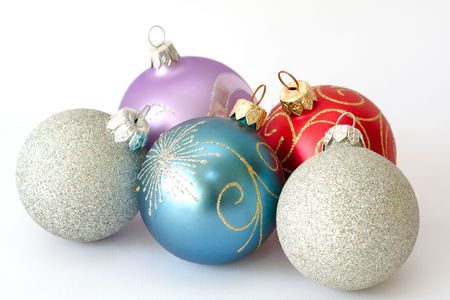 Five christmas balls isolated over white backgroundの写真素材