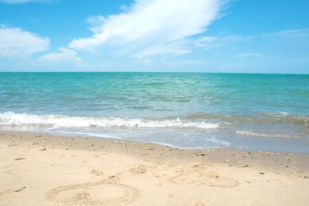 Beautiful tropical beach sand and sea with blue sky background at Hua-Hin District, Thailandの写真素材