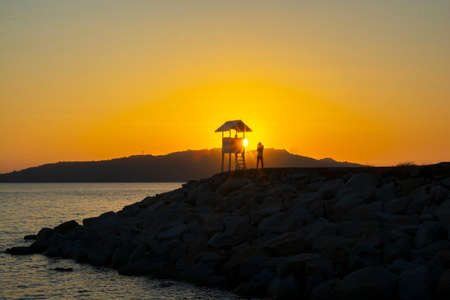 Small white house with morning on the sunset at Khao Laem Ya Thai marine national park. Rayong, Thailand.の写真素材