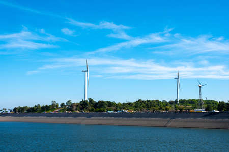 Beautiful landscape of Khao Yai Thiang reservoir with wind turbine electrical energy plant at Nakhon...