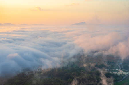 Landscape view on mountain with misty in morning at view point of Phu Thok hill at Chiang Khan Loei province, Thailandの写真素材