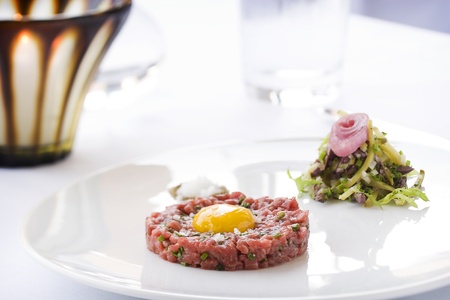 finely plated steak tartare with saladの写真素材