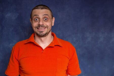 Funny man is smiling. Male European 40 years old. Fool's day concept.