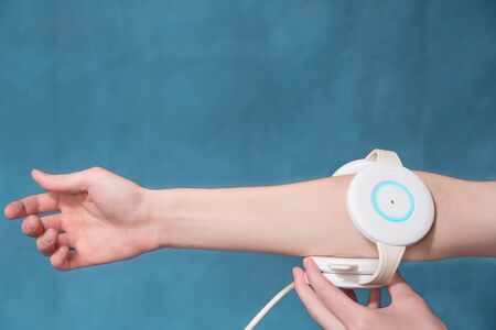 The magnetic therapy device is mounted on a personâ€™s hand. Joint treatment with a magnetic...
