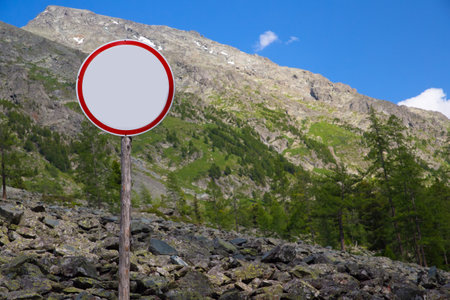 No traffic sign with high mountains in the background.の写真素材