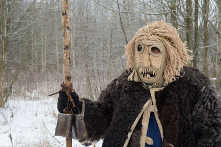 A man in a demon costume during caroling. Folk Slavic holidays and customs.