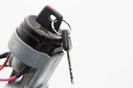 Car ignition lock with key inserted. close-up photo.