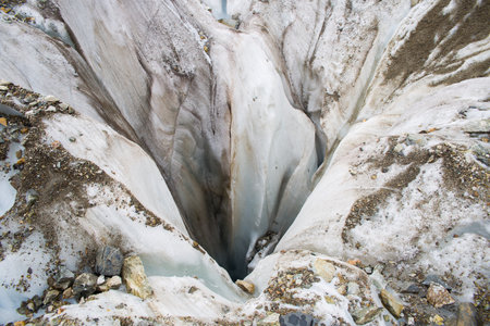 Dangerous deep crack in the glacier.の写真素材