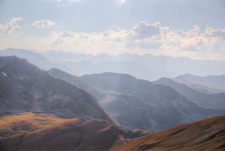 High mountain ranges. Low contrast image. Backlighting.の写真素材