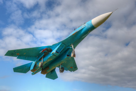 Russian Su-27 fighter aircraft against the sky.