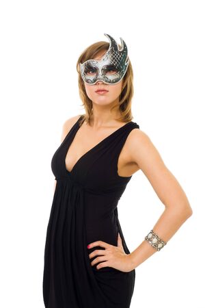Young beautiful woman standing  in venetian mask standingの写真素材