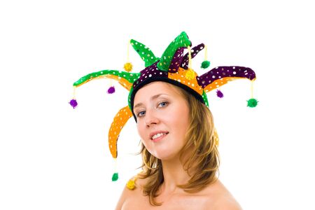 Face of a woman in funny cap with bell smiling and looking at cameraの写真素材