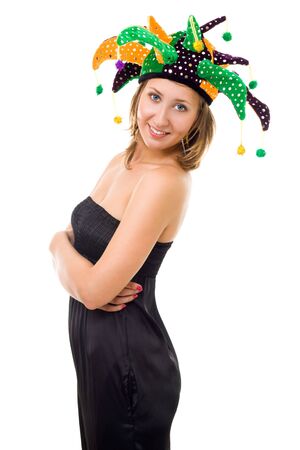 Young woman at party with amazing smile and funny hat looking at cameraの写真素材