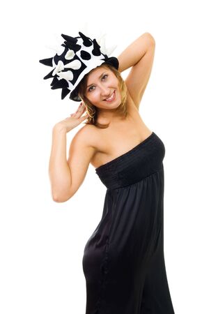 Happy young woman in party wearing funny hat and smilingの写真素材
