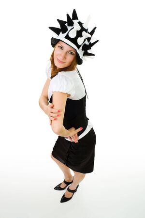 Happy confident smiling woman wearing party hat isolated on white top viewの写真素材