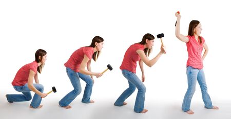 Evolution of mainkind representd by woman with hammerの写真素材