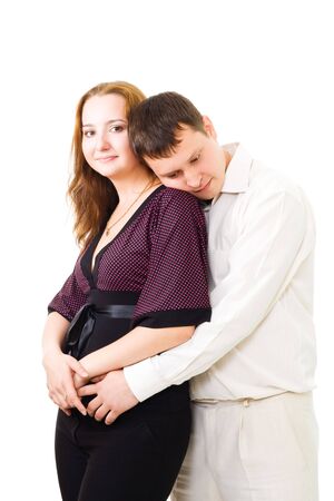 Wife smiling and husband with his head on her shoulder isolated on whiteの写真素材