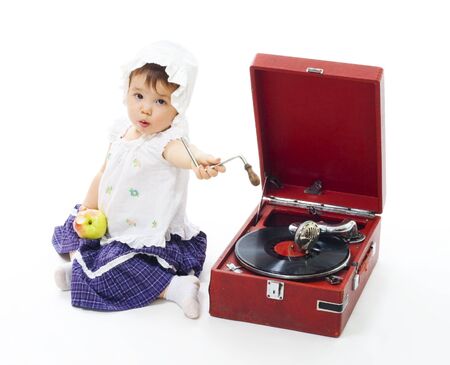 Baby broke gramophone and need technical support to fix it,isolated on whieの写真素材