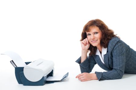 Happy woman in formal clothes lay near printer and smile, isolated on white