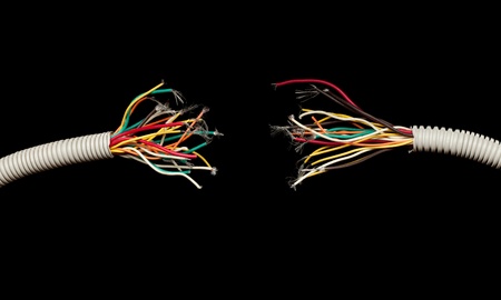 torn apart wires isolated on black background