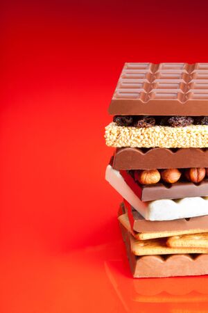Pile of variety of sweets, chocolate and other barsの写真素材