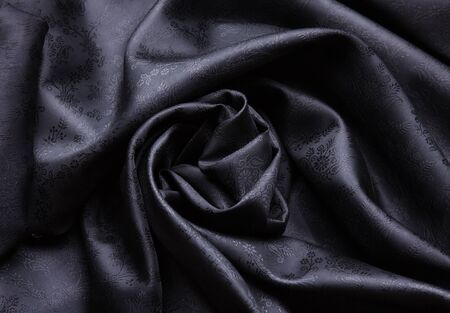 Beautiful folded black silk fabric