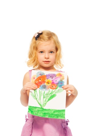 Little blond girl showing her drawing picture with flowers, isolated on whiteの写真素材