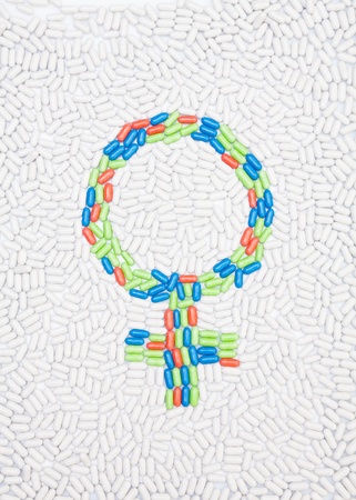 Female symbol made of drug pills put into shape as mosaicの写真素材