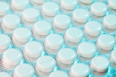 Plastic package with white drugs tablets