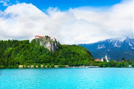 Bled, Slovenia, castle and village in front of Alp castlesの写真素材