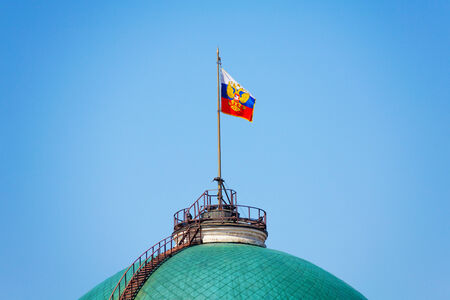 Russian flag on Senate Palace in Moscow Kremlinの写真素材