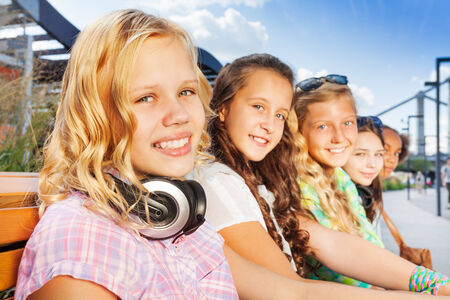 Close up view of blond girl and her friends