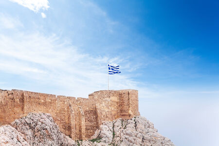 Greek flag on Acropolis in Athens, Greeceの写真素材