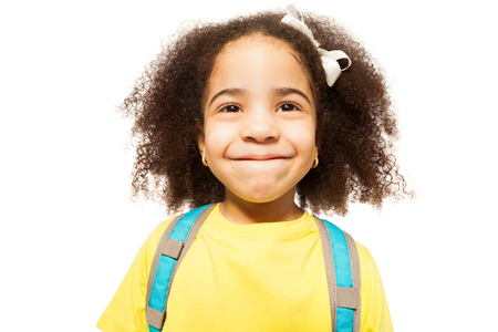 Portrait of small African girl in yellow T-shirtの写真素材