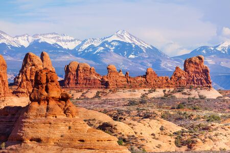 Beautiful view of Arches park plateau and Mt Waas near Arches National Park in USA during summer sunny dayの写真素材