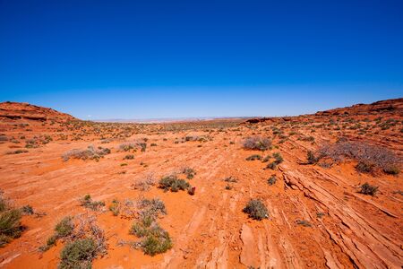Vast desert near Colorado river canyons, Canyonlands National Park, USA during sunny summer dayの写真素材