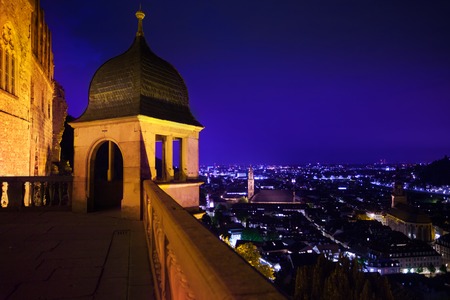 Schloss Heidelberg and night panorama of city in darkness in Heidelberg, Germanyの写真素材