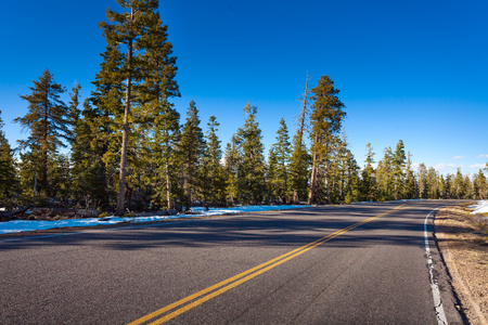 Road in Bruce canyon national park at winter time with snow, USAの写真素材