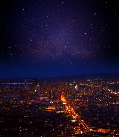 View of San Francisco downtown district during the night with stars in the skyの写真素材