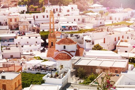 View of the centre of Lindos with beautiful five-storied stone tower, Greece