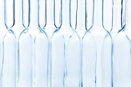 Empty glass bottles arranged chess-board fashionの写真素材