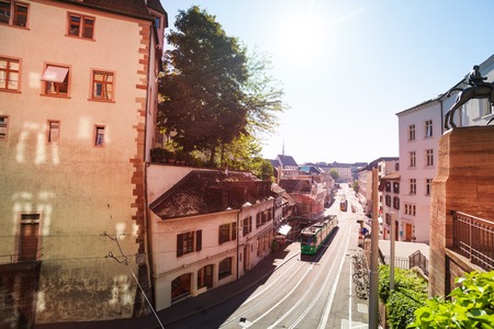 City tram on the ancient street of Basel in summerの写真素材