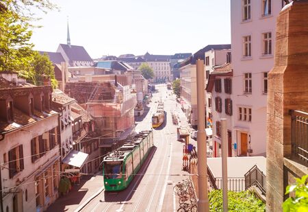 Basel streets with city trams, shops and housesの写真素材