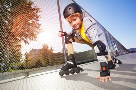 Roller skater posing on floor at rollerdromの写真素材