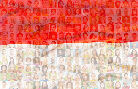 Poland flag with many face portraits on background of different looking and age diverse citizensの写真素材