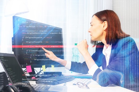 Business woman working with computer in the officeの写真素材