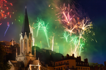 Fireworks in night sky over St George Church, Lyonの写真素材
