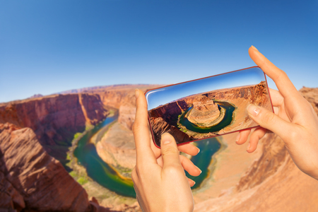 Taking photo of canyon horse shoe in USA Utahの写真素材