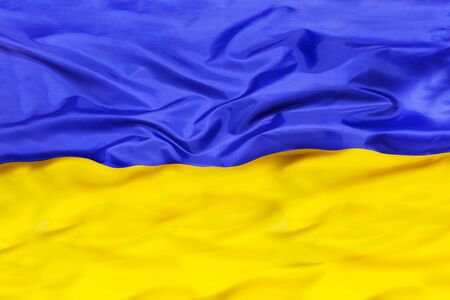 Ukraine national flag with waving fabricの写真素材